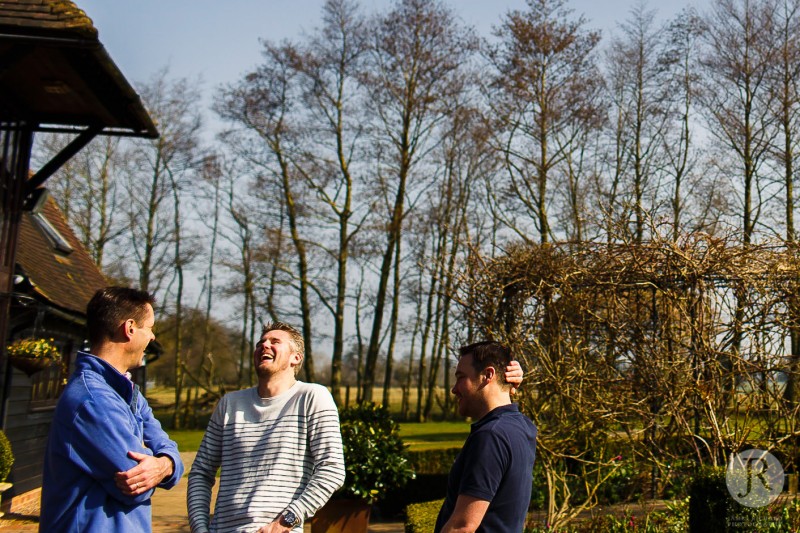 Groomsmen having a laugh before the ceremony