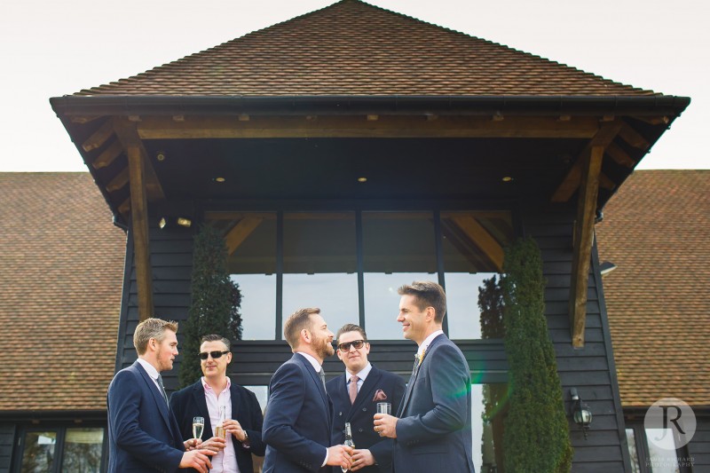 Groom and groomsmen having fun together 