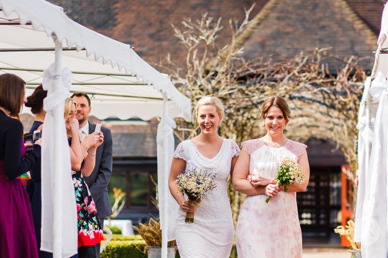 Karen walking down the aisle during her wedding ceremony