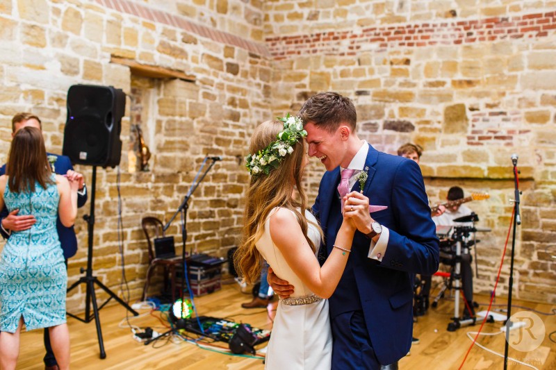 Oli and Natalie have their first dance at Hendall Manor Barns