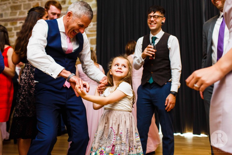 Father of the groom dancing with his niece