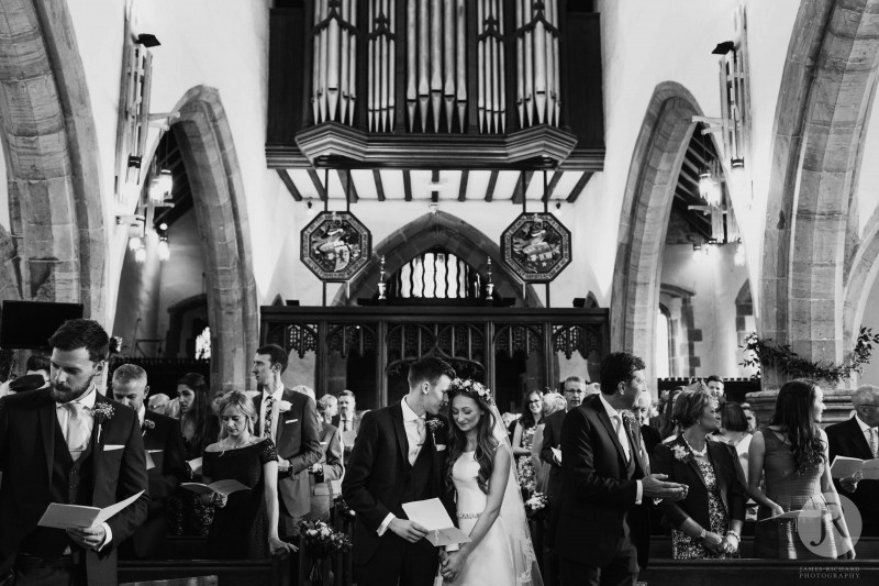 Bride and groom having an intimate moment during the ceremony