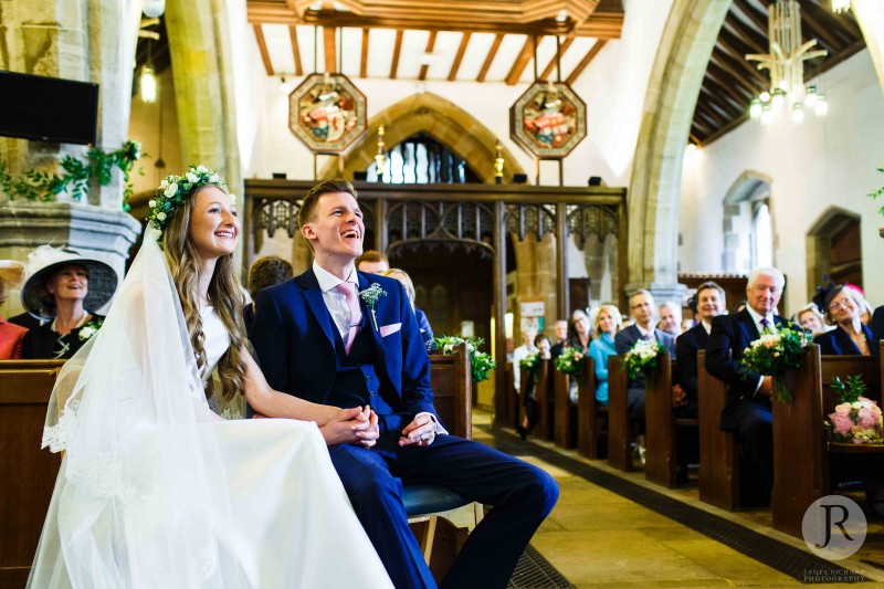 Oli laughing hard during at the vicar's talk